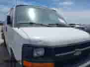 2014 Chevrolet Express Cargo with VIN 1GCSGAFX3E1163645, listed as a IAAI auction lot 42621079 with 251,814 mi miles and . Bid and sale history available at DreamBid. Image 1.