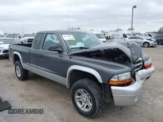 2003 Dodge Dakota SLT with VIN 1D7HG42N43S297223, listed as a IAAI auction lot 43267825 with 159,794 mi miles and . Bid and sale history available at DreamBid. Image 1.