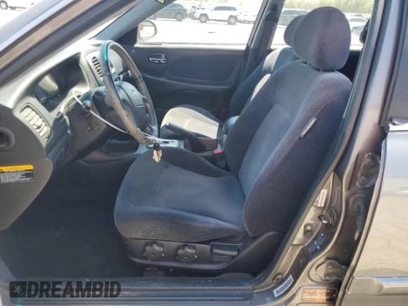 2002 Hyundai Sonata z VIN KMHWF25S72A624112, wystawiony jako Copart lot #56196195 z przebiegiem 54 206 mil mil oraz Szkoda całkowita • Salvage title. Historia ofert i sprzedaży dostępna na DreamBid. Obrazek 7.