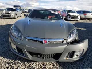 2009 Saturn Sky Red Line с VIN 1G8MT35X09Y106005, выставлен на аукционе Copart как лот 81554004 с пробегом 76 054 миль миль и Списание • Salvage title. История ставок и продаж доступна на DreamBid. Изображение 5.