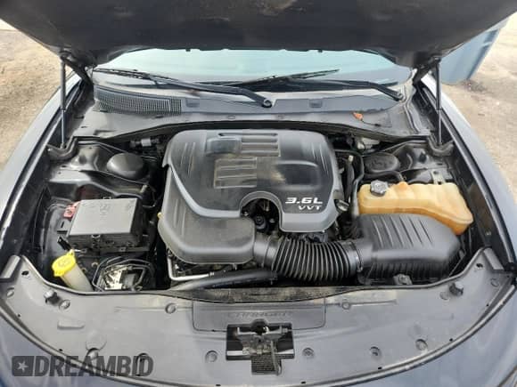 2015 Dodge Charger SE с VIN 2C3CDXBG7FH867229, выставлен на аукционе Copart как лот 82050975 с пробегом 161 972 миль миль и Списание • Salvage title. История ставок и продаж доступна на DreamBid. Изображение 11.