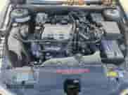 1999 Pontiac Grand Am GT z VIN 1G2NW12EXXM869943, wystawiony jako Copart lot #65240175 z przebiegiem 148 984 mil mil oraz Nie do naprawy • Non repairable. Historia ofert i sprzedaży dostępna na DreamBid. Obrazek 11.