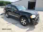 2008 Jeep Grand Cherokee Overland with VIN 1J8HR68278C177665, listed as a Copart auction lot 69455425 with 207,262 mi miles and Salvage title. Bid and sale history available at DreamBid. Image 4.