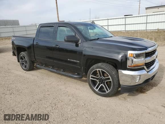 2016 Chevrolet Silverado 1500 LT with VIN 3GCUKREC0GG386816, listed as a Copart auction lot 52044055 with 149,146 mi miles and Salvage title. Bid and sale history available at DreamBid. Image 4.