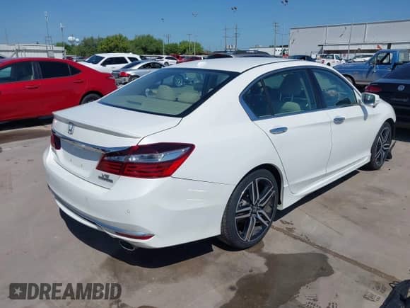 2017 Honda Accord Touring with VIN 1HGCR3F93HA040834, listed as a IAAI auction lot 41979952 with 79,686 mi miles and . Bid and sale history available at DreamBid. Image 4.