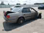 1993 Honda Accord с VIN 1HGCB757XPA014595, выставлен на аукционе Copart как лот 62500145 с пробегом 290 252 миль миль и Списание • Salvage title. История ставок и продаж доступна на DreamBid. Изображение 3.