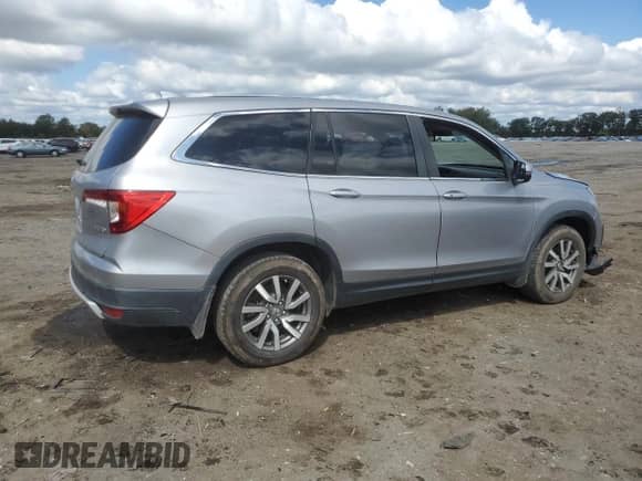 2022 Honda Pilot EX-L with VIN 5FNYF6H54NB021107, listed as a Copart auction lot 80446585 with 61,122 mi miles and Salvage title. Bid and sale history available at DreamBid. Image 3.