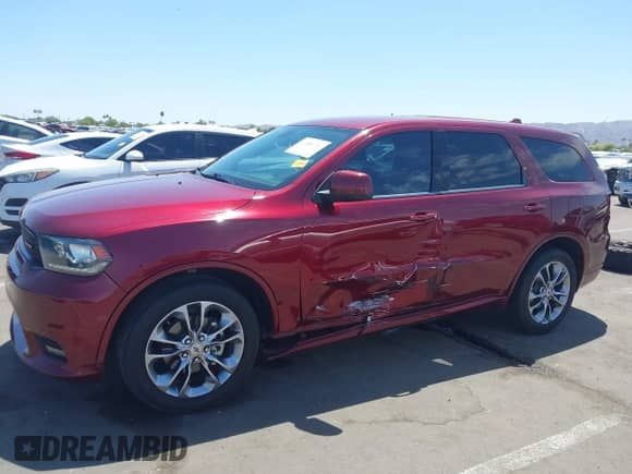 2019 Dodge Durango GT Plus with VIN 1C4RDHDGXKC582353, listed as a IAAI auction lot 42140686 with 117,553 mi miles and . Bid and sale history available at DreamBid. Image 2.