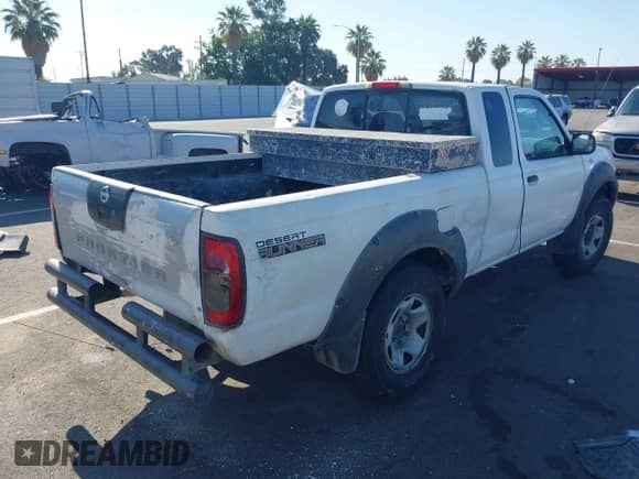 2002 Nissan Frontier XE with VIN 1N6ED26T32C309306, listed as a IAAI auction lot 42853455 with 346,928 mi miles and . Bid and sale history available at DreamBid. Image 4.