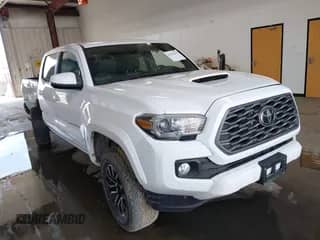 2021 Toyota Tacoma SR with VIN 5TFCZ5AN0MX256078, listed as a IAAI auction lot 42576632 with 53,529 mi miles and . Bid and sale history available at DreamBid. Image 1.