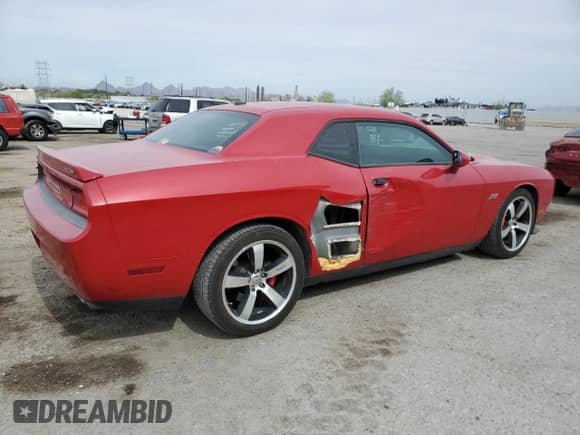 2012 Dodge Challenger SRT-8 392 с VIN 2C3CDYCJ7CH153774, выставлен на аукционе Copart как лот 56973935 с пробегом 52 070 миль миль и Списание • Salvage title. История ставок и продаж доступна на DreamBid. Изображение 3.