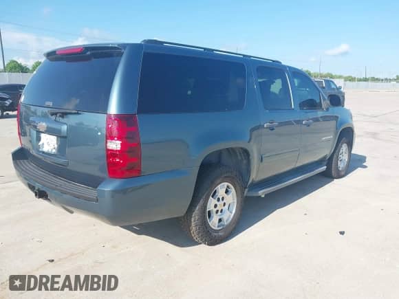 2010 Chevrolet Suburban LS with VIN 1GNUKHE30AR235032, listed as a IAAI auction lot 42971599 with 133,675 mi miles and . Bid and sale history available at DreamBid. Image 4.