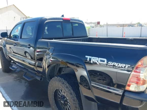 2014 Toyota Tacoma PreRunner with VIN 3TMKU4HN6EM041841, listed as a IAAI auction lot 42082629 with Not provided miles and . Bid and sale history available at DreamBid. Image 14.