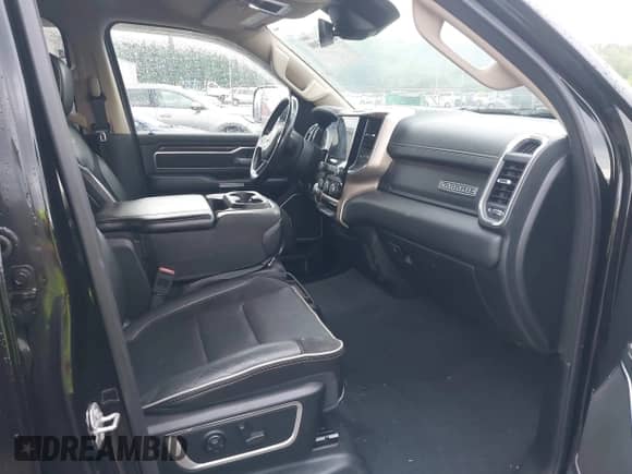 2019 Ram 1500 Laramie with VIN 1C6RREJT8KN506787, listed as a IAAI auction lot 42282300 with 63,302 mi miles and . Bid and sale history available at DreamBid. Image 5.