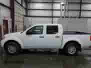 2016 Nissan Frontier SV z VIN 1N6AD0EVXGN765854, wystawiony jako IAAI lot #43465196 z przebiegiem 71 731 mil mil oraz . Historia ofert i sprzedaży dostępna na DreamBid. Obrazek 14.