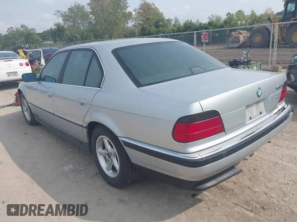 1997 BMW 7 Series 740i with VIN WBAGF8324VDL48308, listed as a IAAI auction lot 43157917 with 174,361 mi miles and . Bid and sale history available at DreamBid. Image 3.