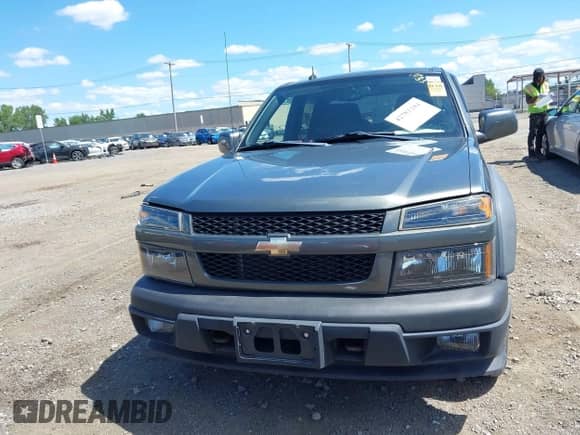 2011 Chevrolet Colorado 1LT z VIN 1GCHTCFE5B8113848, wystawiony jako IAAI lot #42781184 z przebiegiem 64 485 mil mil oraz . Historia ofert i sprzedaży dostępna na DreamBid. Obrazek 12.