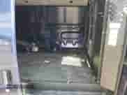 2013 Ford Econoline Cargo Commercial с VIN 1FTSE3EL9DDB15452, выставлен на аукционе Copart как лот 77189684 с пробегом 24 513 миль миль и Списание • Salvage title. История ставок и продаж доступна на DreamBid. Изображение 10.