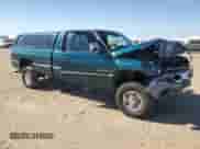 1996 Dodge 2500 with VIN 3B7KF23C0TM142973, listed as a Copart auction lot 77576514 with 162,908 mi miles and Salvage title. Bid and sale history available at DreamBid. Image 4.