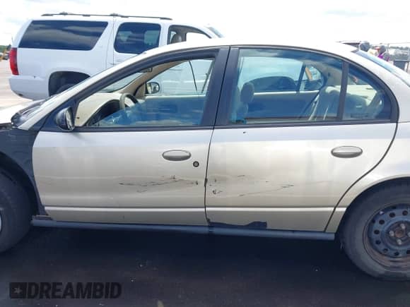 2002 Saturn SL с VIN 1G8ZK52712Z234021, выставлен на аукционе IAAI как лот 43119833 с пробегом 292 780 миль миль и . История ставок и продаж доступна на DreamBid. Изображение 14.