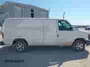 2013 Ford Econoline Cargo Commercial with VIN 1FTNE1EW2DDB01761, listed as a IAAI auction lot 43038503 with 266,605 mi miles and . Bid and sale history available at DreamBid. Image 13.