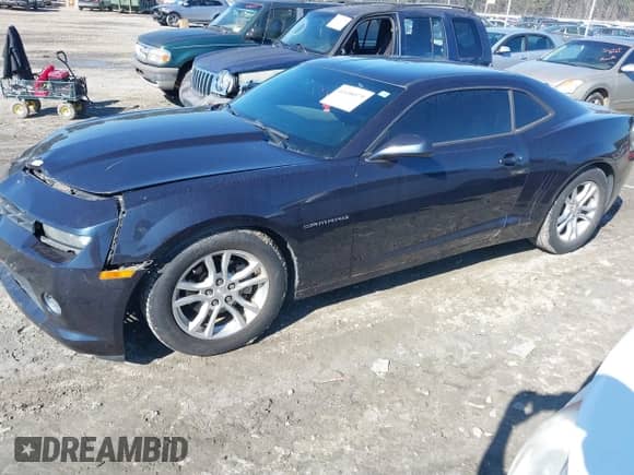 2014 Chevrolet Camaro LS z VIN 2G1FA1E35E9320257, wystawiony jako IAAI lot #41458979 z przebiegiem 98 900 mil mil oraz . Historia ofert i sprzedaży dostępna na DreamBid. Obrazek 21.
