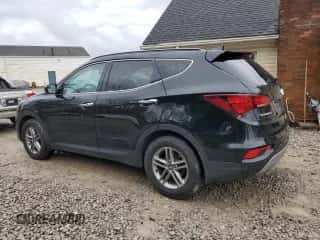 2018 Hyundai Santa Fe 2.4L z VIN 5NMZU3LBXJH106984, wystawiony jako Copart lot #85736695 z przebiegiem 183 364 mil mil oraz Czysty tytuł • Clean title. Historia ofert i sprzedaży dostępna na DreamBid. Obrazek 2.
