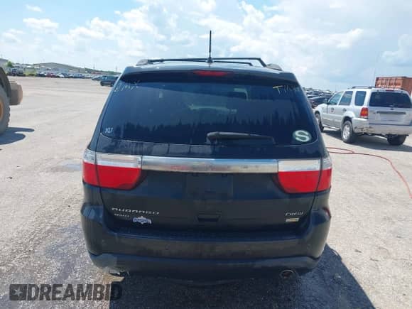 2013 Dodge Durango Crew with VIN 1C4RDJDG0DC664649, listed as a IAAI auction lot 42934942 with 152,231 mi miles and . Bid and sale history available at DreamBid. Image 16.