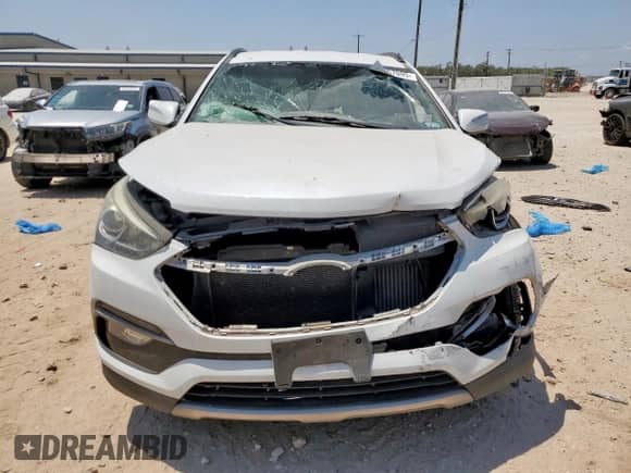 2018 Hyundai Santa Fe 2.0T with VIN 5NMZU4LA6JH075536, listed as a Copart auction lot 69057095 with 52,348 mi miles and Salvage title. Bid and sale history available at DreamBid. Image 5.