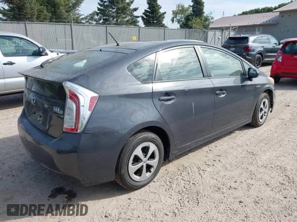 2013 Toyota Prius One with VIN JTDKN3DU4D5631299, listed as a IAAI auction lot 43110671 with 194,020 mi miles and . Bid and sale history available at DreamBid. Image 4.