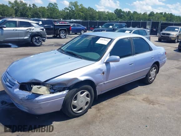 1997 Toyota Camry LE z VIN JT2BF22K2V0021868, wystawiony jako IAAI lot #43070012 z przebiegiem 128 808 mil mil oraz . Historia ofert i sprzedaży dostępna na DreamBid. Obrazek 17.