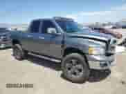 2005 Dodge 1500 SLT with VIN 1D7HA18N55J574090, listed as a Copart auction lot 69483745 with 142,691 mi miles and Salvage title. Bid and sale history available at DreamBid. Image 4.