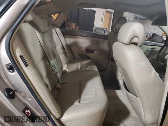 2006 Hyundai Azera SE с VIN KMHFC46F56A107936, выставлен на аукционе Copart как лот 86268794 с пробегом Не указан миль и Списание • Salvage title. История ставок и продаж доступна на DreamBid. Изображение 10.