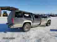 1996 Chevrolet Suburban с VIN 1GNFK16R0TJ417592, выставлен на аукционе Copart как лот 42424015 с пробегом 238 536 миль миль и Чистый • Clean title. История ставок и продаж доступна на DreamBid. Изображение 3.