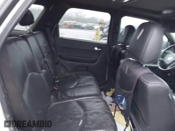 2008 Mercury Mariner with VIN 4M2CU91128KJ03668, listed as a IAAI auction lot 41213830 with 240,480 mi miles and . Bid and sale history available at DreamBid. Image 8.