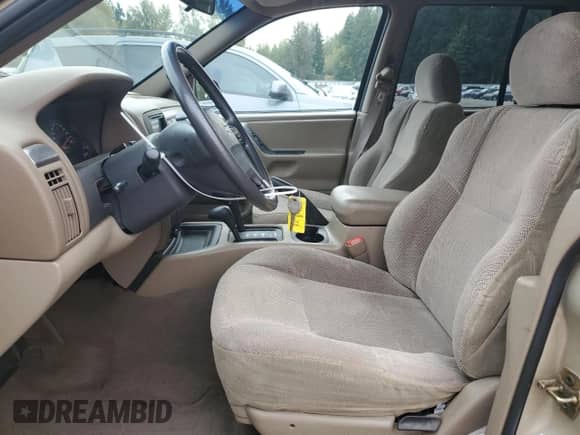 2001 Jeep Grand Cherokee Laredo с VIN 1J4GW48S51C595710, выставлен на аукционе Copart как лот 82590275 с пробегом 71 420 миль миль и Списание • Salvage title. История ставок и продаж доступна на DreamBid. Изображение 7.