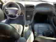 2004 Ford Mustang Deluxe с VIN 1FAFP44404F117628, выставлен на аукционе Copart как лот 81377524 с пробегом 39 697 миль миль и Списание • Salvage title. История ставок и продаж доступна на DreamBid. Изображение 8.