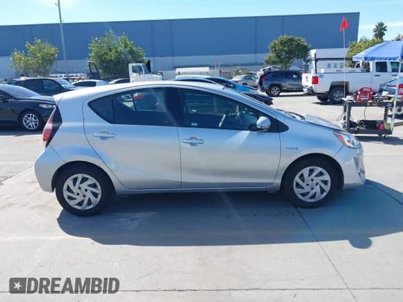 2016 Toyota Prius One z VIN JTDKDTB38G1137584, wystawiony jako IAAI lot #43451035 z przebiegiem 496 420 mil mil oraz . Historia ofert i sprzedaży dostępna na DreamBid. Obrazek 13.