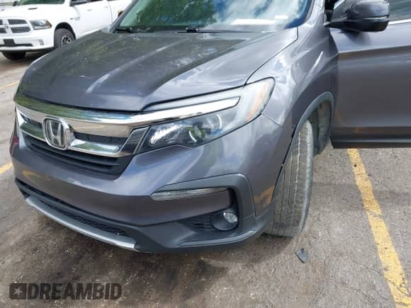 2019 Honda Pilot EX-L z VIN 5FNYF6H5XKB018384, wystawiony jako IAAI lot #43167792 z przebiegiem Nie podano mil oraz . Historia ofert i sprzedaży dostępna na DreamBid. Obrazek 17.