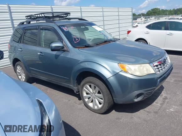 2012 Subaru Forester X Limited z VIN JF2SHBEC0CH420297, wystawiony jako IAAI lot #42977627 z przebiegiem 170 820 mil mil oraz . Historia ofert i sprzedaży dostępna na DreamBid. Obrazek 1.