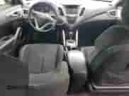 2015 Hyundai Veloster z VIN KMHTC6ADXFU226603, wystawiony jako Copart lot #83825545 z przebiegiem 136 233 mil mil oraz Szkoda całkowita • Salvage title. Historia ofert i sprzedaży dostępna na DreamBid. Obrazek 8.