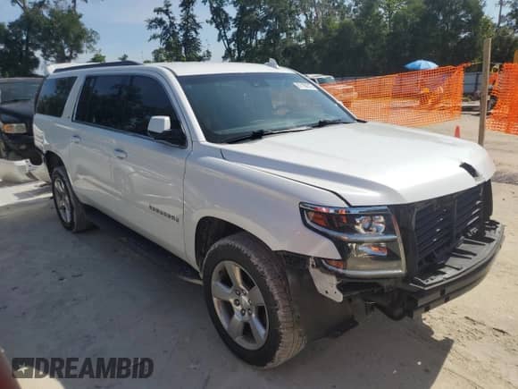 2020 Chevrolet Suburban LT with VIN 1GNSCHKC4LR187014, listed as a Copart auction lot 67109215 with 115,612 mi miles and Salvage title. Bid and sale history available at DreamBid. Image 4.