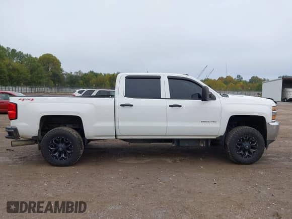 2015 Chevrolet Silverado 2500HD Work Truck with VIN 1GC1KUE89FF140896, listed as a IAAI auction lot 43308782 with 197,170 mi miles and . Bid and sale history available at DreamBid. Image 13.