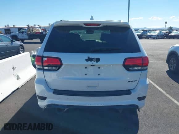 2021 Jeep Grand Cherokee SRT with VIN 1C4RJFDJ3MC561128, listed as a IAAI auction lot 43529278 with Not provided miles and . Bid and sale history available at DreamBid. Image 16.