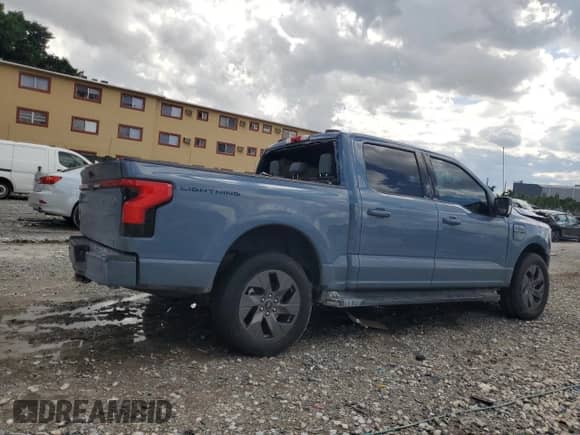 2023 Ford F-150 Lightning Pro with VIN 1FTVW1EV9PWG26295, listed as a Copart auction lot 80298305 with 43,492 mi miles and Salvage title. Bid and sale history available at DreamBid. Image 3.