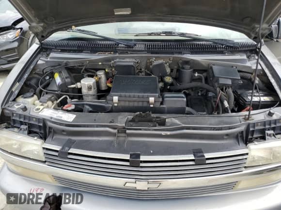 1999 Chevrolet Astro z VIN 1GNDM19WXXB114838, wystawiony jako Copart lot #55070715 z przebiegiem Nie podano mil oraz Szkoda całkowita • Salvage title. Historia ofert i sprzedaży dostępna na DreamBid. Obrazek 12.