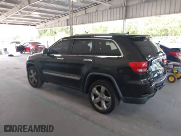 2012 Jeep Grand Cherokee Overland with VIN 1C4RJECG2CC290951, listed as a IAAI auction lot 42327217 with 122,108 mi miles and . Bid and sale history available at DreamBid. Image 15.