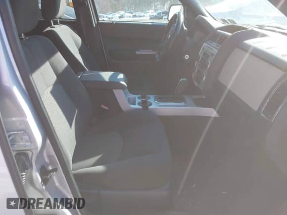 2008 Mercury Mariner with VIN 4M2CU91Z68KJ45797, listed as a IAAI auction lot 41615117 with 87,936 mi miles and . Bid and sale history available at DreamBid. Image 5.