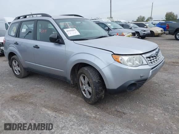 2012 Subaru Forester X with VIN JF2SHABC0CH420220, listed as a IAAI auction lot 43335419 with 127,338 mi miles and . Bid and sale history available at DreamBid. Image 1.