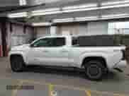 2024 Toyota Tacoma SR5 with VIN 3TMLB5FNXRM023237, listed as a IAAI auction lot 43162178 with 5,914 mi miles and . Bid and sale history available at DreamBid. Image 14.
